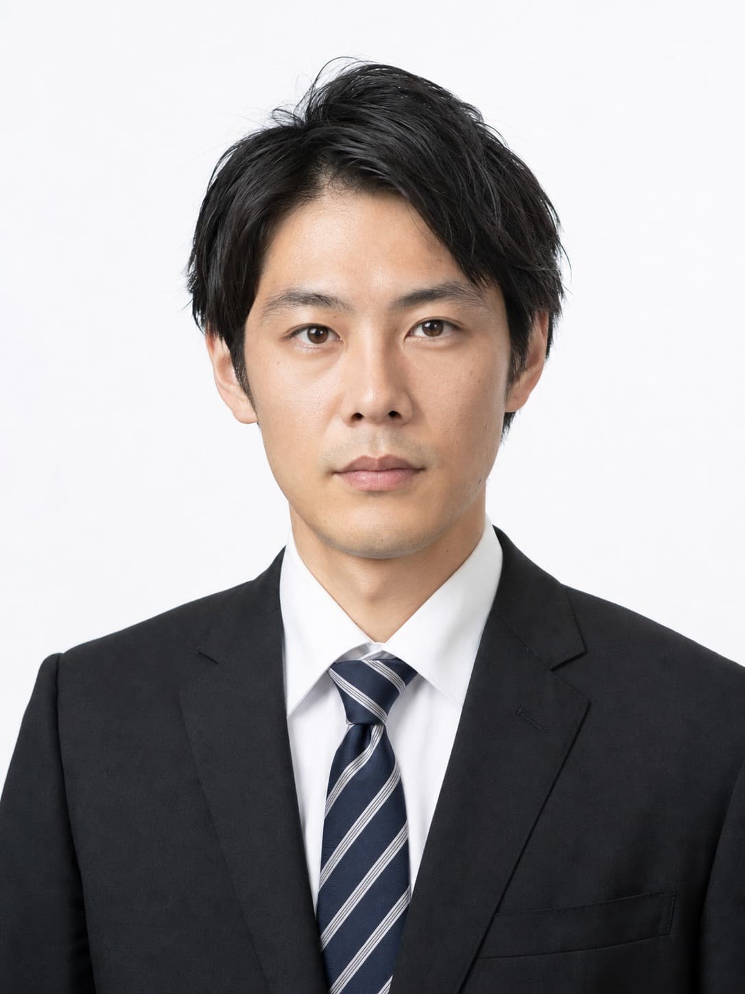 Japanese man in a black suit on a white background
